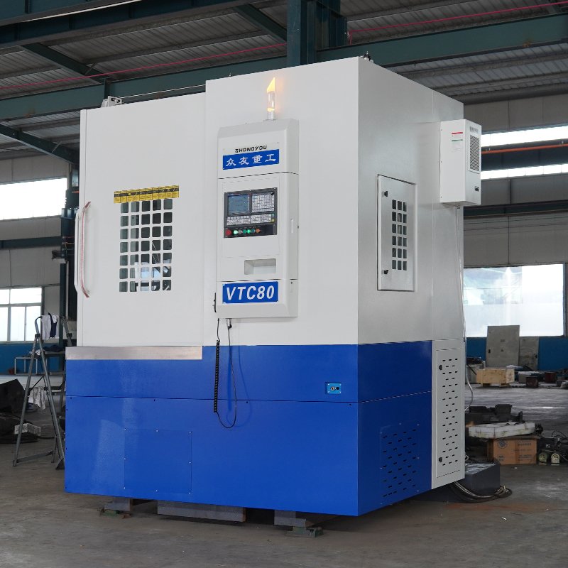 What are the differences between a CNC vertical lathe and a conventional vertical lathe?